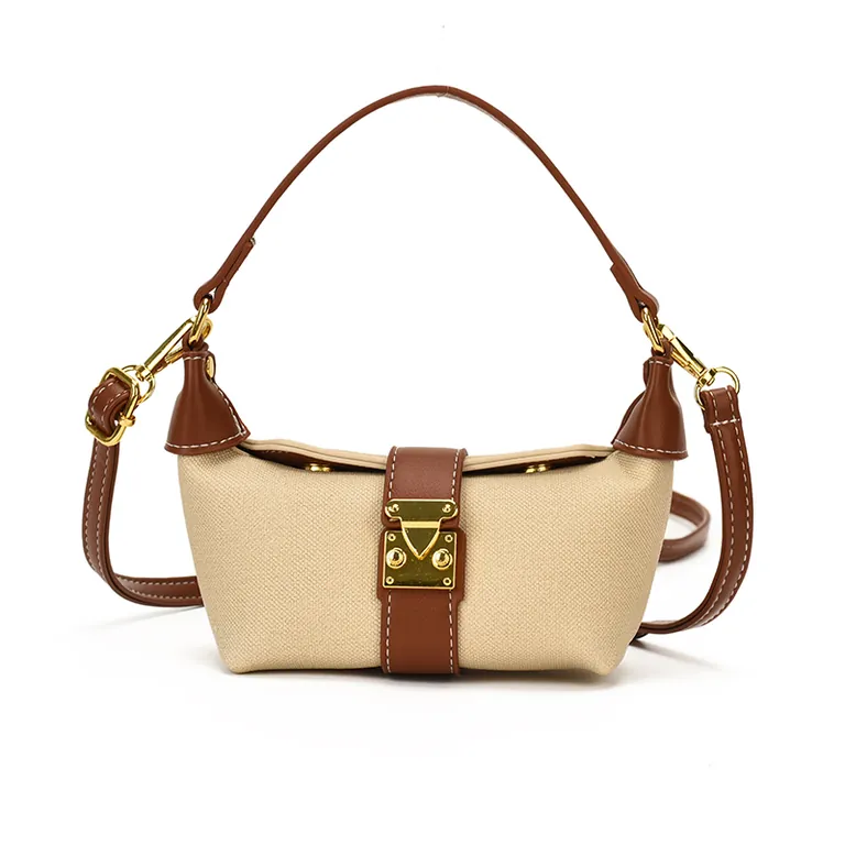 Washed denim blue mini hobo bag with tan leather trim