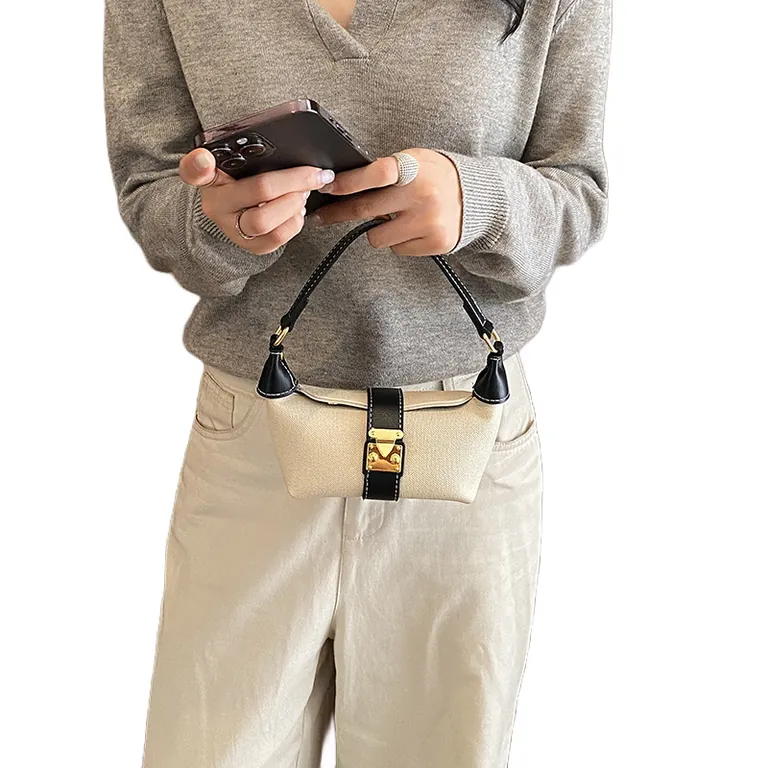 Cream and black contrast mini hobo bag with gold-tone lock